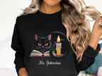 Black Cat Reading with Candle Graphic Sweatshirt product type