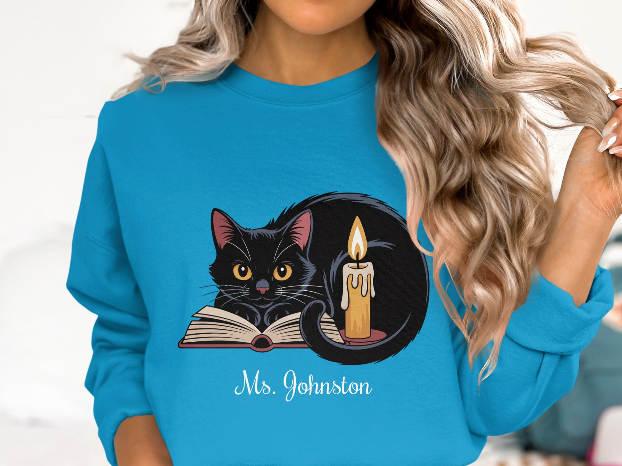 Cozy Reading Cat with Candle Design Sweatshirt Product