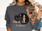 Black Cat with Candle on Open Book Sweatshirt product