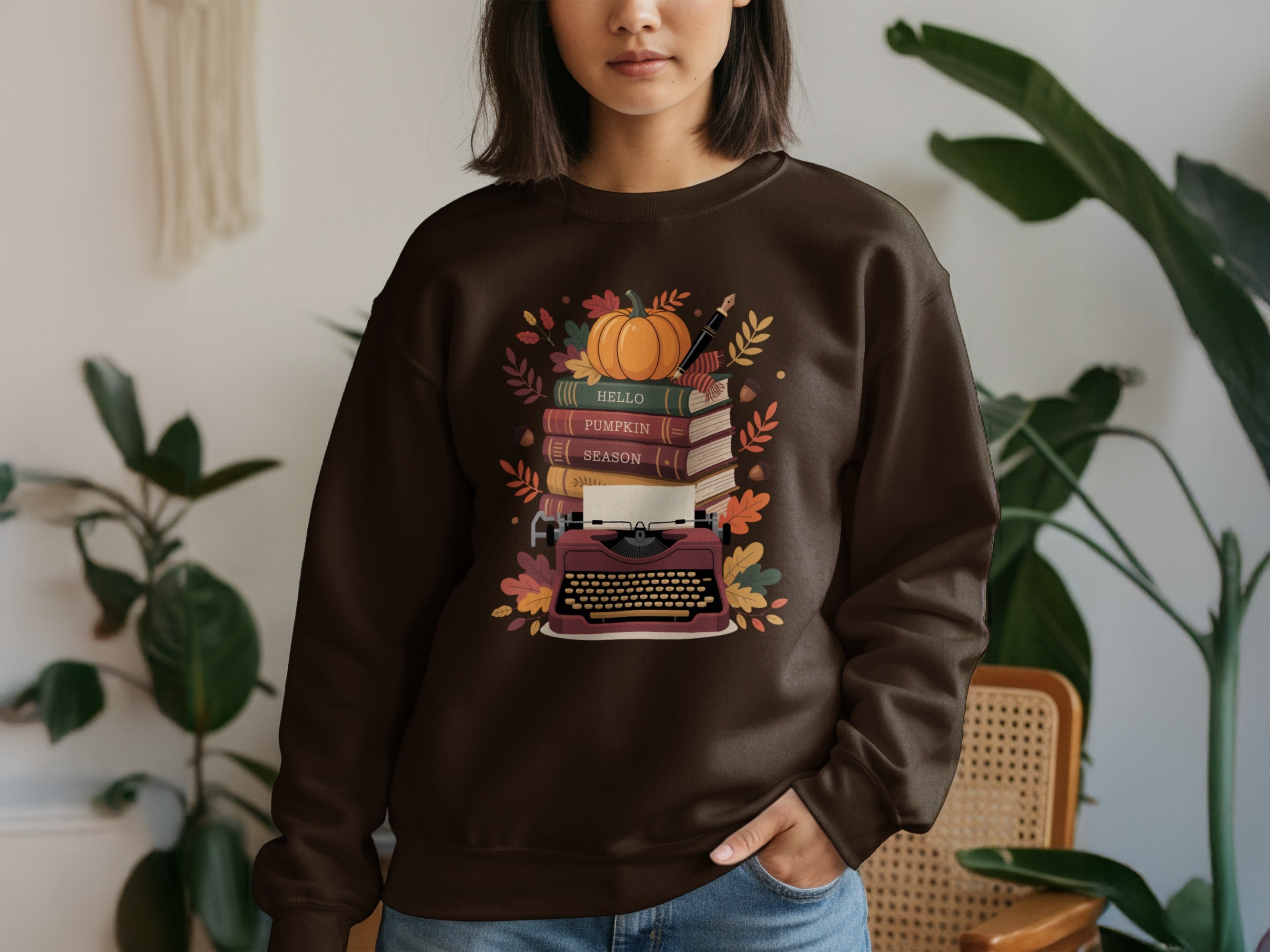 Cozy Autumn Books and Typewriter Graphic Sweatshirt product